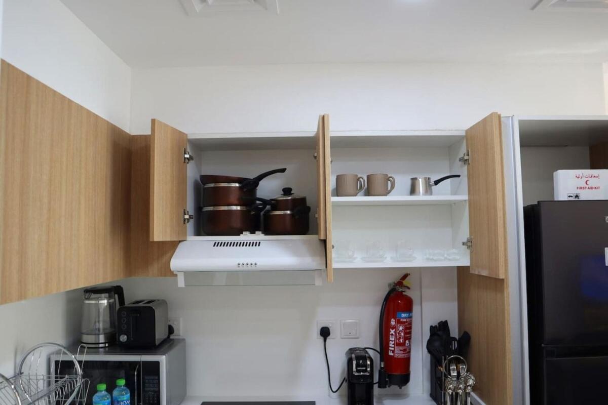 Appartement Stylish 1br Retreat Pool & Wifi Near Auh & Masdar *